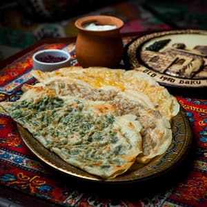 <a href="https://www.freepik.com/free-photo/side-view-qutab-assorted-with-sumac-yogurt-tray_7727082.htm#page=3&query=palak%20paratha&position=13&from_view=search&track=ais">Image by 8photo</a> on Freepik palak paratha